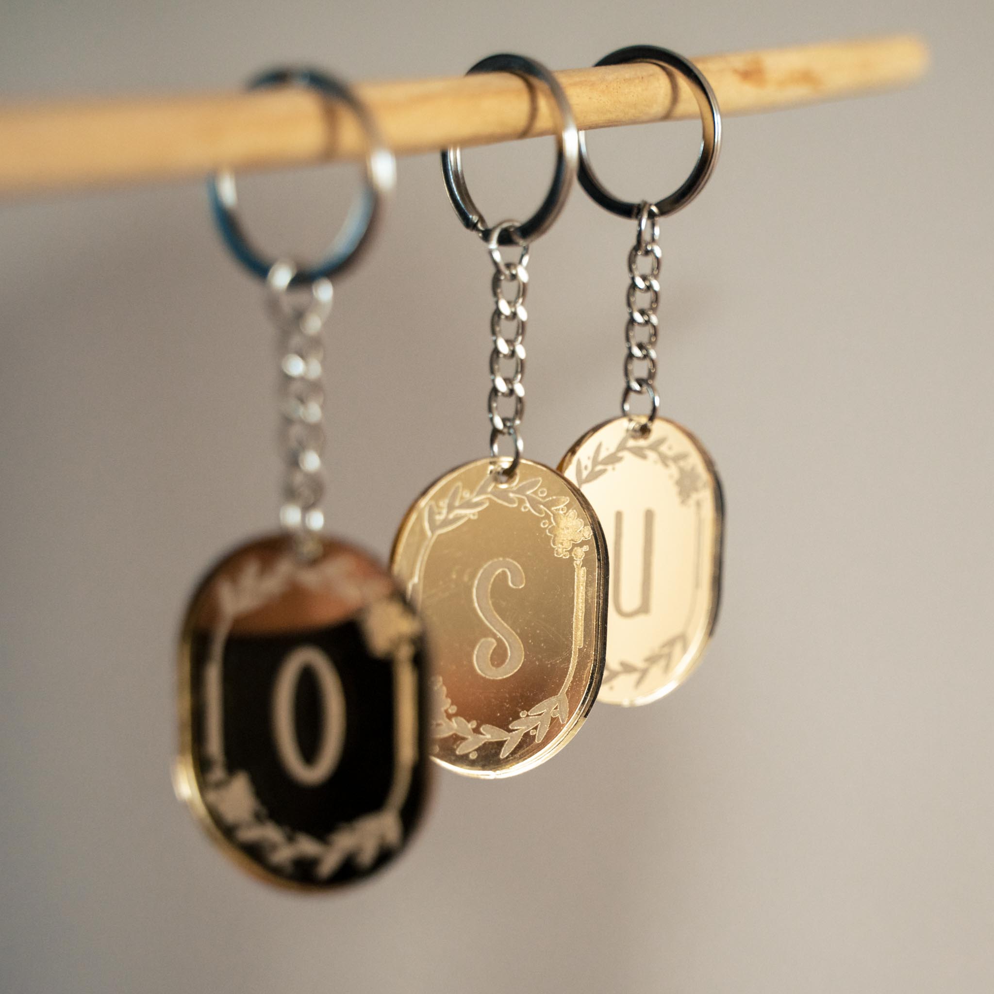 Gouden sleutelhanger letter